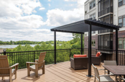 outdoor terrace overlooking a lake at Zvago Glen Lake